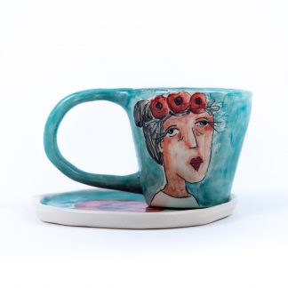 old flower lady handpainted on blue handmade pottery espresso cup