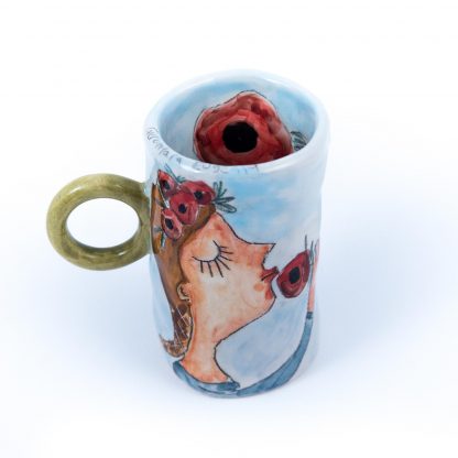 portrait of a girl smelling poppy hand painted on ceramic cup