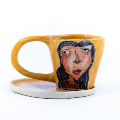 yellow ceramic espresso cup with hand painted portrait