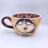XL handmade ceramic cup with hand painted cartoon named Miss Art and colorful painting inside.