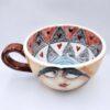 XL handmade ceramic cup with hand painted cartoon named Miss Art and colorful painting inside.