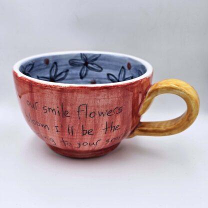 XL handmade ceramic cup with hand painted cartoon named Miss Art and colorful painting inside.