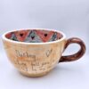 XL handmade ceramic cup with hand painted cartoon named Miss Art and colorful painting inside.