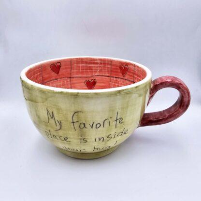 XL handmade ceramic cup with hand painted cartoon named Miss Art and colorful painting inside.