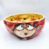 Handmade ceramic salad bowl with hand painted cartoon named Miss Art and colorful painting inside.