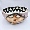 Handmade ceramic salad bowl with hand painted cartoon named Miss Art and colorful painting inside.