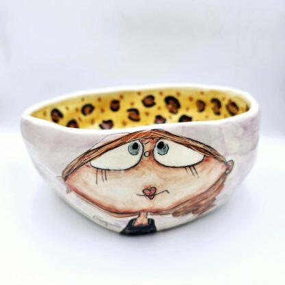 Leopard handmade ceramic salad bowl with hand painted cartoon named Miss Art and colorful painting inside.