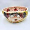 Handmade ceramic salad bowl with hand painted cartoon named Miss Art and colorful painting inside.