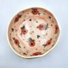 Handmade ceramic salad bowl with hand painted cartoon named Miss Art and colorful painting inside.