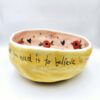 Handmade ceramic salad bowl with hand painted cartoon named Miss Art and colorful painting inside.