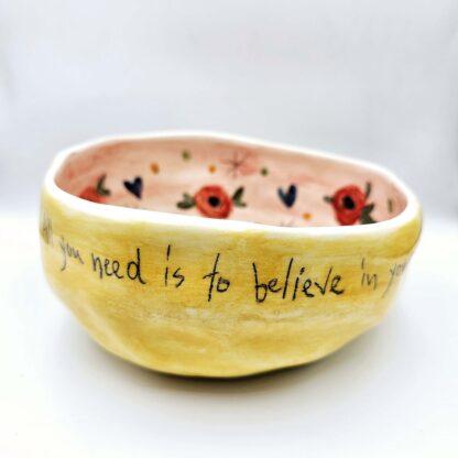 Handmade ceramic salad bowl with hand painted cartoon named Miss Art and colorful painting inside.