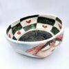 Handmade ceramic salad bowl with hand painted cartoon named Miss Art and colorful painting inside.