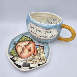 Unique, handmade and hand painted pottery tea cup