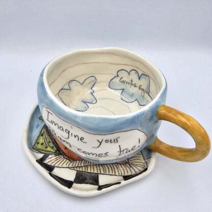 Unique, handmade and hand painted pottery tea cup