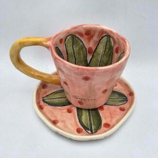 Floral ceramic espresso cup with handle and saucer