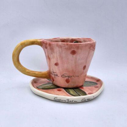 Floral ceramic espresso cup with handle and saucer