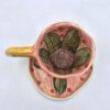 Floral ceramic espresso cup with handle and saucer