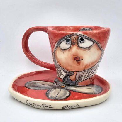 Cute pottery espresso cup with handle and saucer