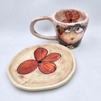 Unique pottery espresso cup with handle and saucer