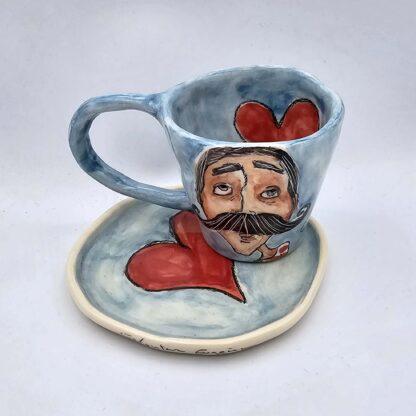 Unique stoneware espresso cup with handle and saucer