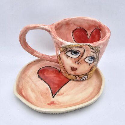 Cute stoneware espresso cup with handle and saucer
