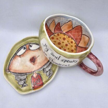 One of a kind ceramic tea cup with handle and saucer