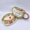 One of a kind ceramic tea cup with handle and saucer