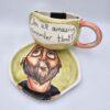 Cute stoneware tea cup with handle and plate