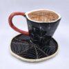 Stoneware espresso cup with handle and saucer