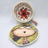 Pottery tea cup with handle and saucer