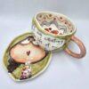 Pottery tea cup with handle and saucer