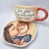 Stoneware tea cup with handle and saucer