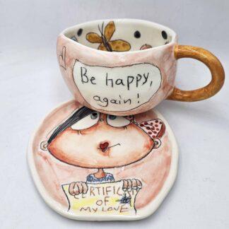 Ceramic tea cup with handle and plate, handmade with stoneware clay