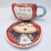 Handmade and hand painted stoneware tea cup