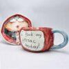 Handmade and hand painted stoneware tea cup