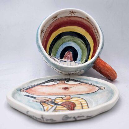 Handmade and hand painted stoneware tea cup
