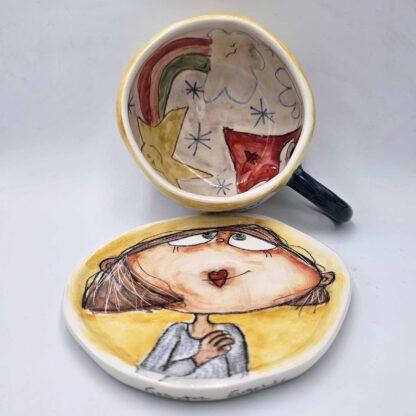 Ceramic tea cup with plate